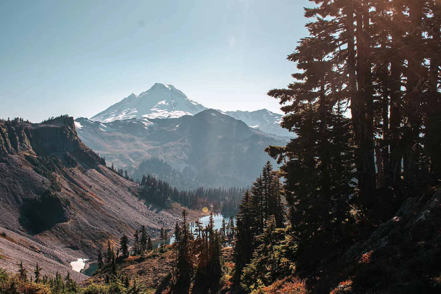 Mt Baker with fall colors and golden hues with iceberg lake below it